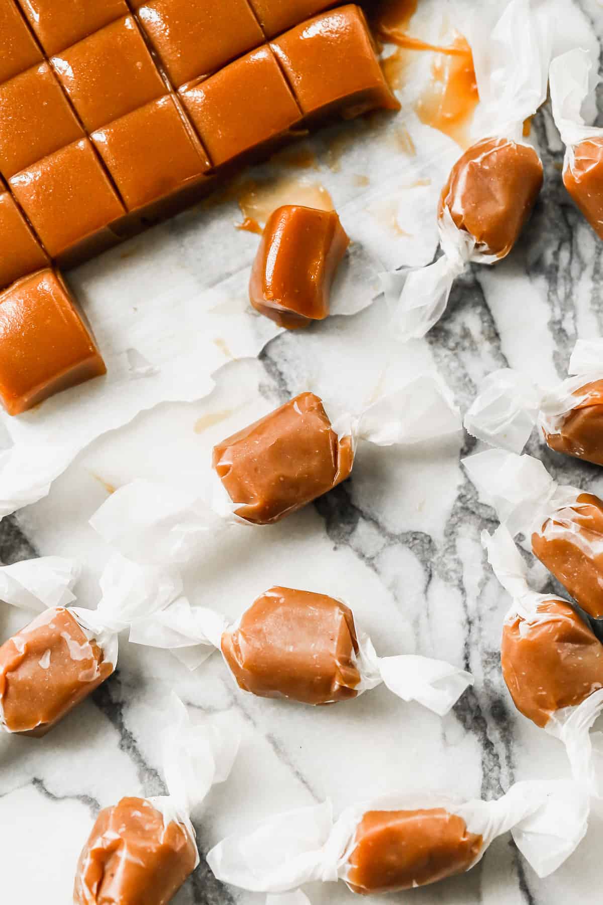 The best caramel recipe, wrapped in parchment paper to enjoy as candy.