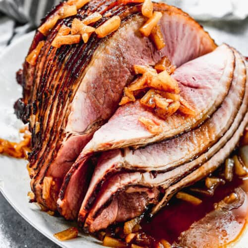The best Baked Ham recipe is warm, moist, and covered in a delicious pineapple brown sugar glaze. It's perfect for holidays or any special occasion and the leftovers are so versatile!