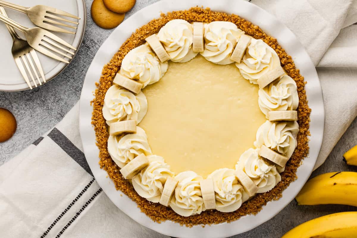This easy Banana Cream Pie recipe has bananas and a homemade pudding inside a Nilla wafer crust. It's smooth, creamy, and always a hit!