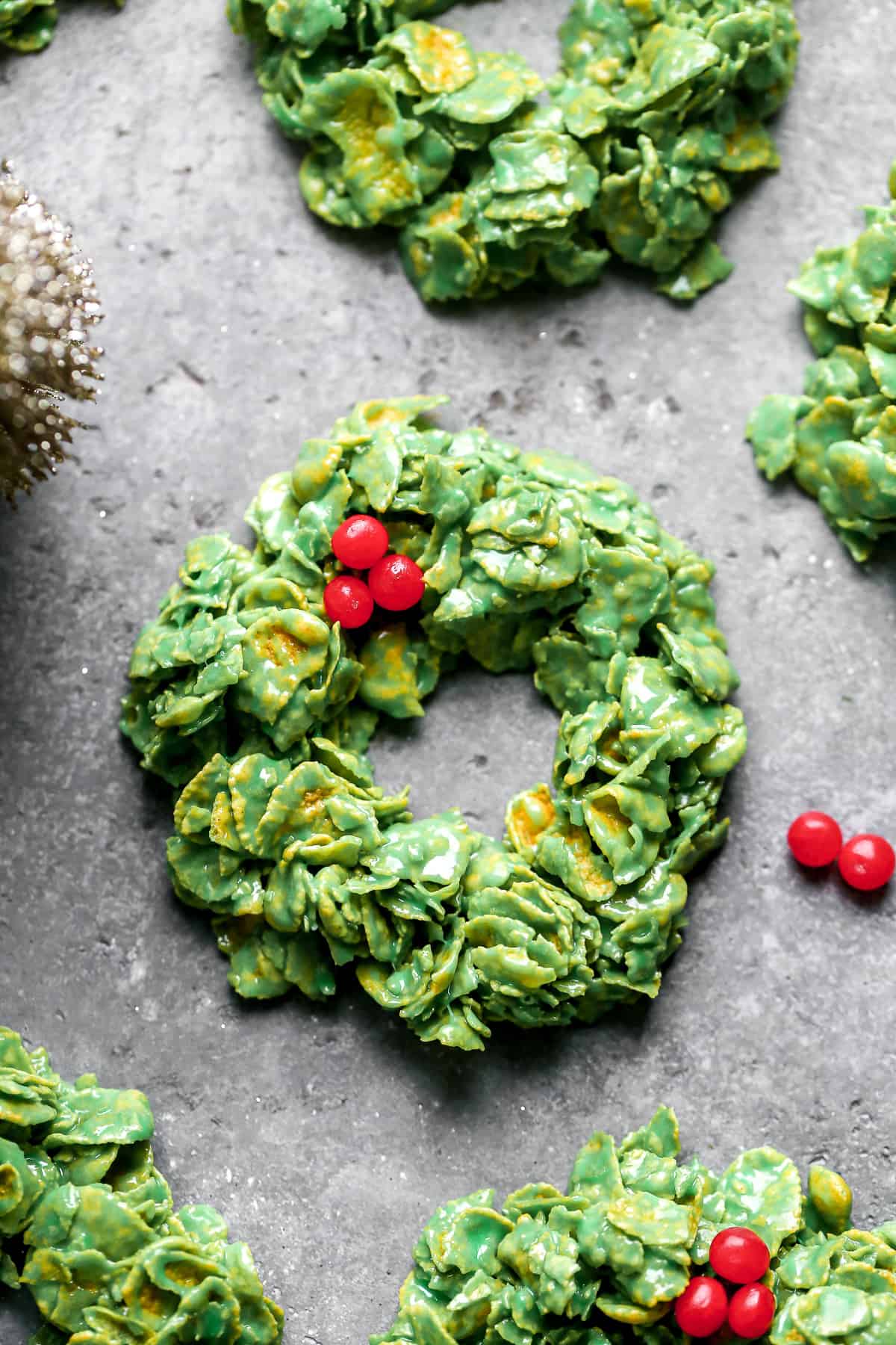 Homemade Cornflake Wreath with three little candy red hots to make mistletoe.