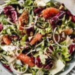 The best Radicchio Salad recipe has a delicious balsamic vinaigrette drizzled on a salad bed of radicchio, grapefruit, pistachios, and parmesan shavings. It's a showstopper and only takes 20 minutes!