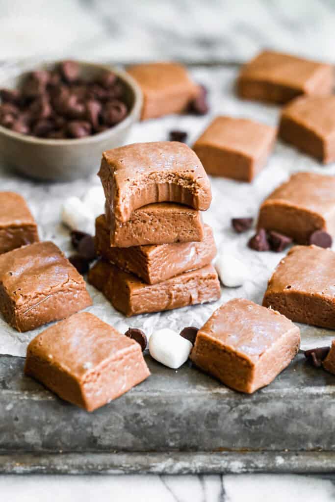This easy Chocolate Fudge recipe makes the creamiest, richest homemade fudge with just 7 simple ingredients! No candy thermometer needed and perfect for holidays, parties, and gifting.