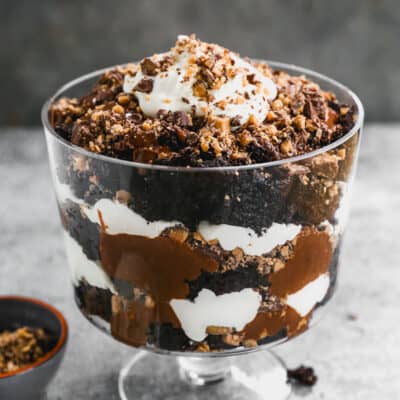 A homemade Chocolate Trifle with chocolate cake, chocolate pudding, crushed heath bars, and whipped cream.