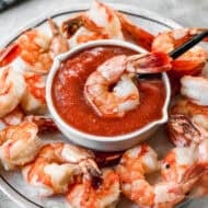 This easy Shrimp Cocktail recipe only takes 5 minutes and 3 ingredients. It tastes fresher and better than anything you can buy at the store!