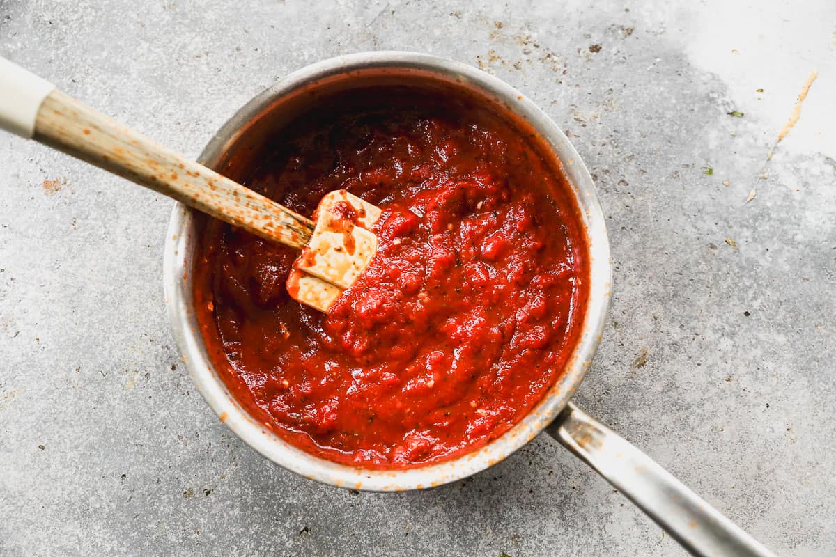 An easy pizza sauce recipe in a sauce pan.