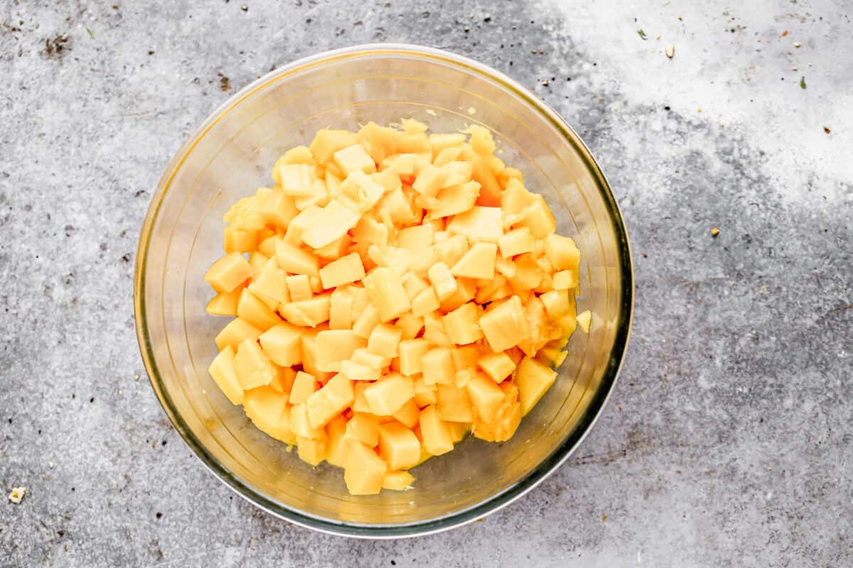 Diced mango in a large bowl to make an old fashioned mango chutney recipe.