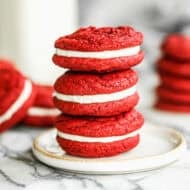 These Red Velvet Oreo cookies are soft, chewy, and have a smooth cream cheese frosting in the middle. They are festive, fun to make, and so tasty to eat!