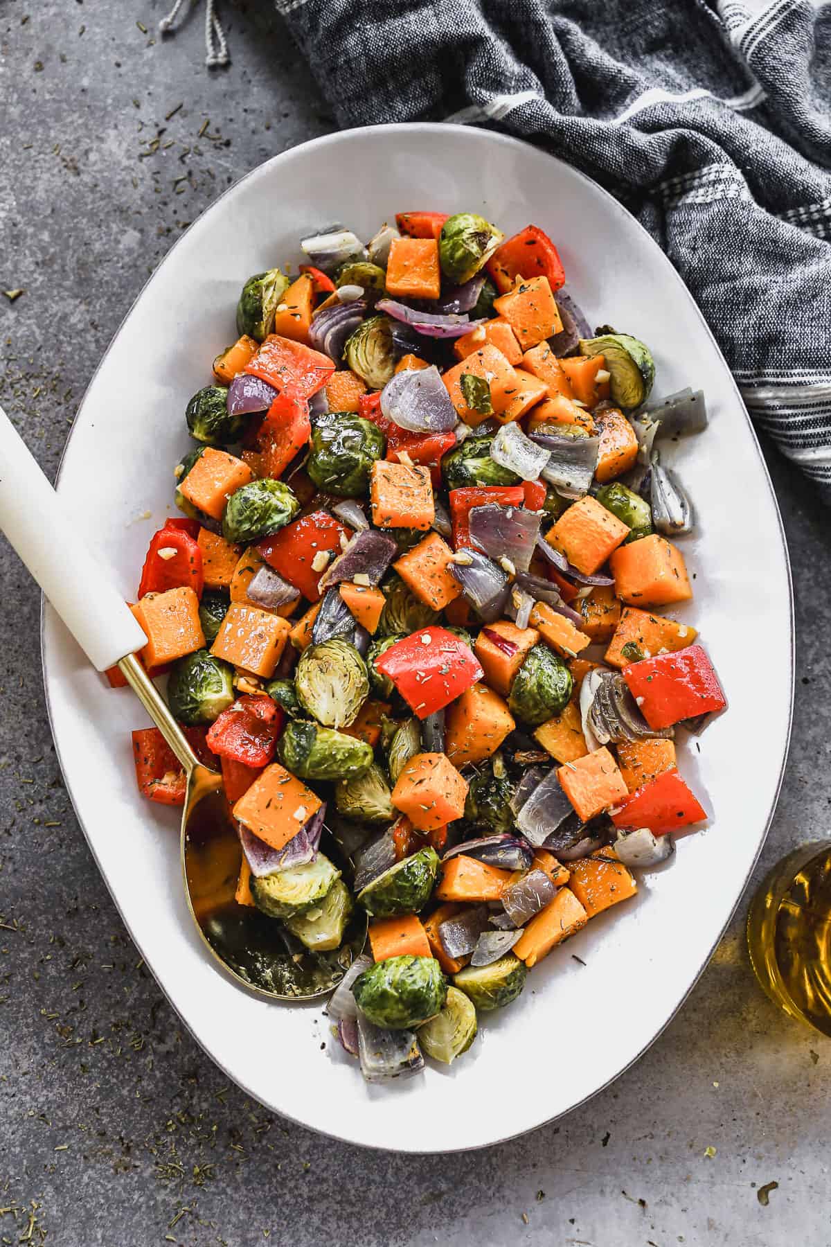 An oval serving dish filled with easy Roasted Vegetables, ready to serve.