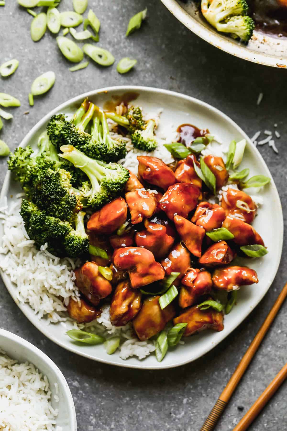 The best Teriyaki Chicken recipe on a bed of hot cooked rice with steamed broccoli. 