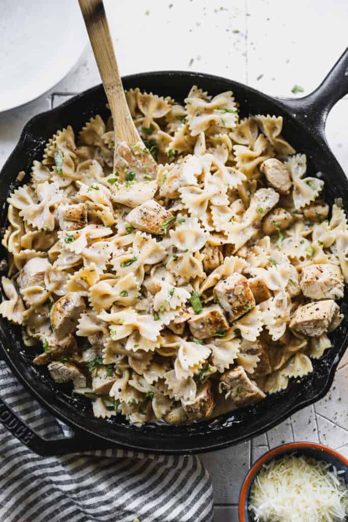 Boursin Pasta with Chicken, served in a cast iron skillet.