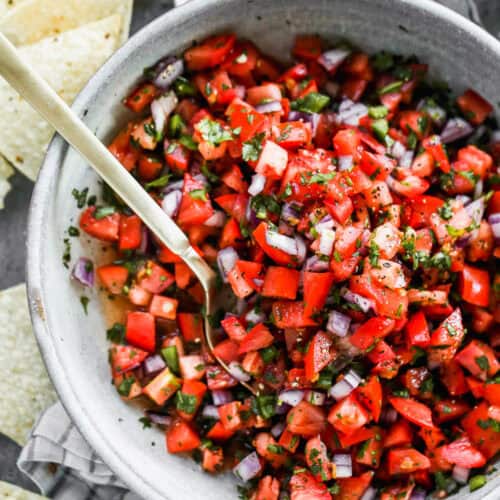 A bowl filled with homemade pico de gallo, ready to be served.
