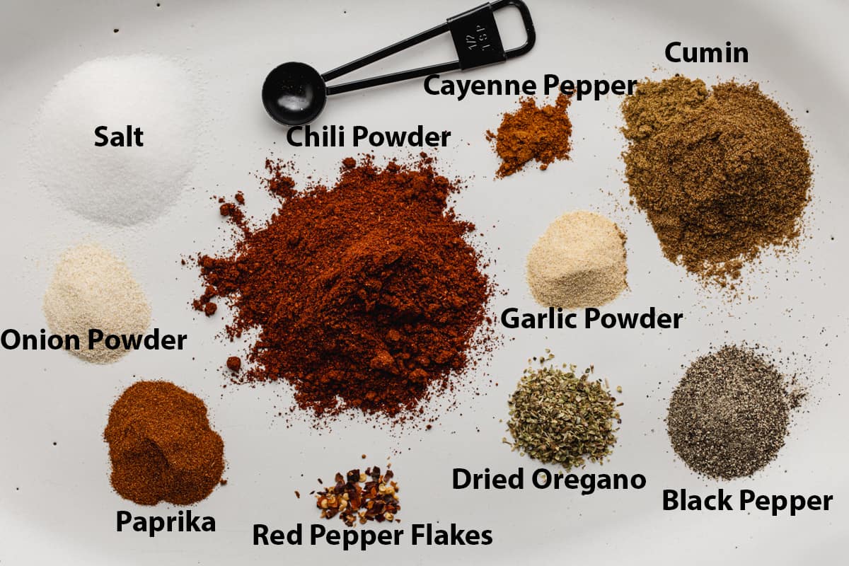 All of the ingredients needed to make homemade taco seasoning.