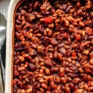 This BBQ Baked Beans recipe are flavorful with bacon and a homemade bubbly sauce. They only take 15 minutes to prep and are better than any can!