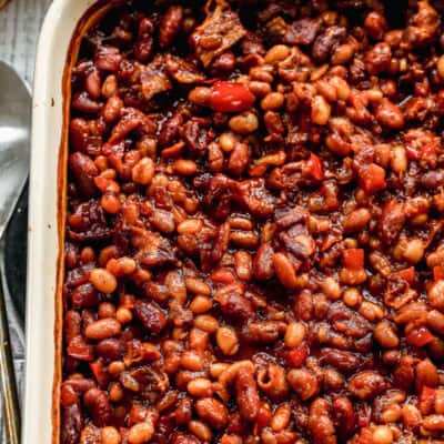 This BBQ Baked Beans recipe are flavorful with bacon and a homemade bubbly sauce. They only take 15 minutes to prep and are better than any can!