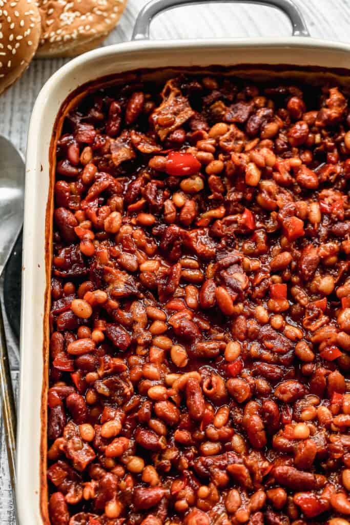This BBQ Baked Beans recipe are flavorful with bacon and a homemade bubbly sauce. They only take 15 minutes to prep and are better than any can!