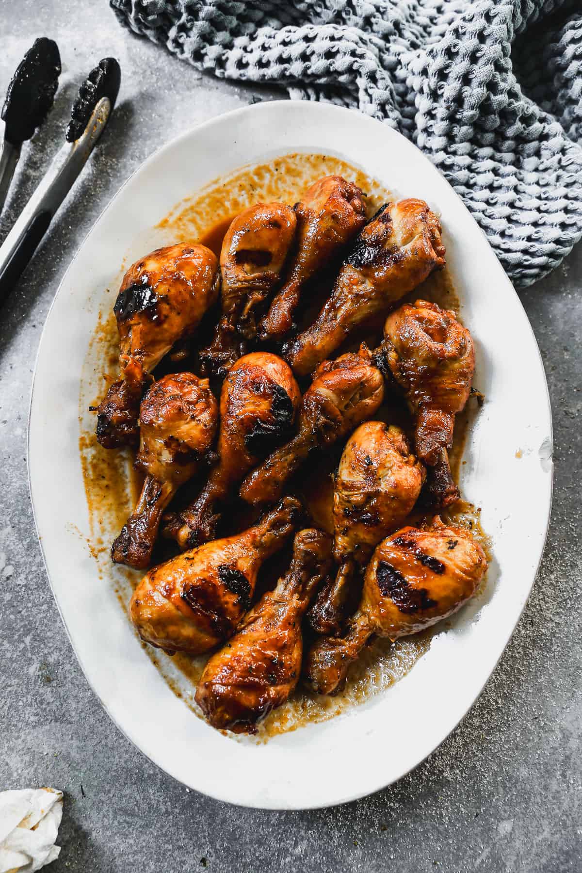 The best BBQ Chicken Drumsticks recipe in a platter, ready to enjoy.