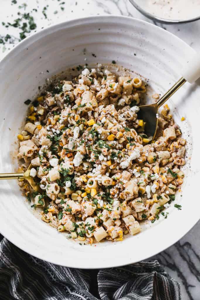 This easy Mexican Street Corn Pasta Salad is packed with bold flavors and makes a fun twist on a classic BBQ side dish. Perfect for potlucks or summer dinners.