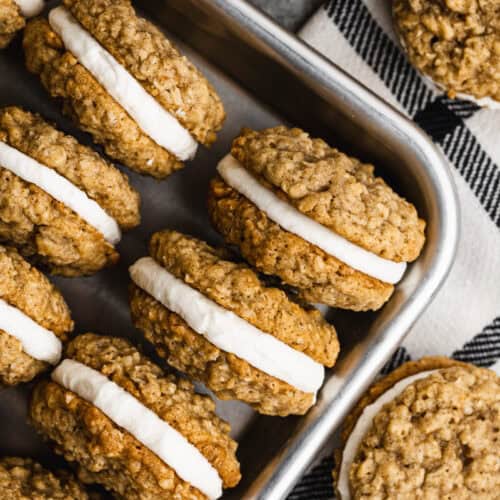 Homemade Oatmeal Cream Pies recipe with a filling, lined in a pan and ready to serve.