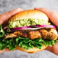 This homemade Grilled Chicken Sandwich recipe will knock any restaurant version out of the park! We have a well seasoned chicken breast topped with fresh veggies and avocado on a toasted bun.