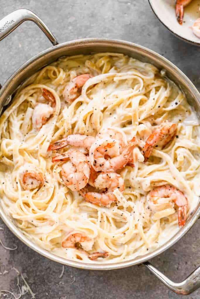 This easy Shrimp Alfredo recipe has tender shrimp in a creamy, homemade alfredo sauce, ready in just 30 minutes!