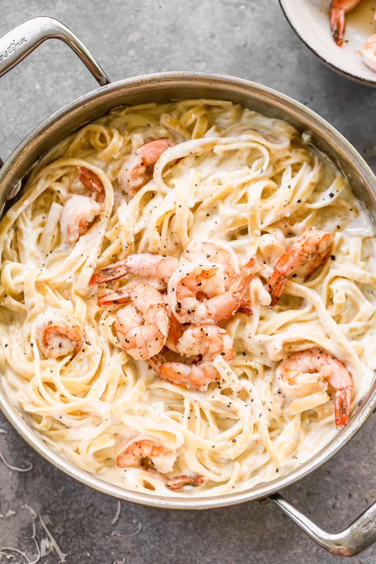 This easy Shrimp Alfredo recipe has tender shrimp in a creamy, homemade alfredo sauce, ready in just 30 minutes!