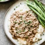 This simple Hamburger Gravy recipe is affordable, easy, and on the table in 20 minutes. Best part, my kids devour it every single time!