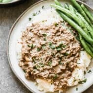 This simple Hamburger Gravy recipe is affordable, easy, and on the table in 20 minutes. Best part, my kids devour it every single time!