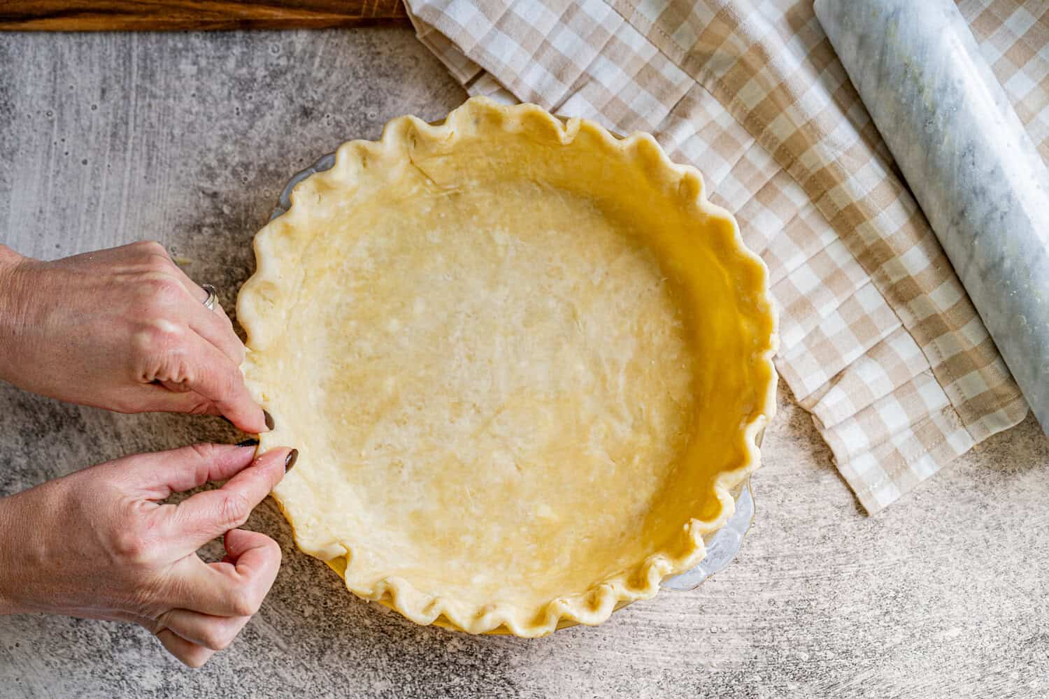 This easy Pie Crust recipe only uses a few ingredients and couldn't be more simple to make! It's flaky, buttery, and so much better than anything you can buy!