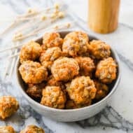 A bowl of Cheesy Sausage Balls baked and ready to eat.