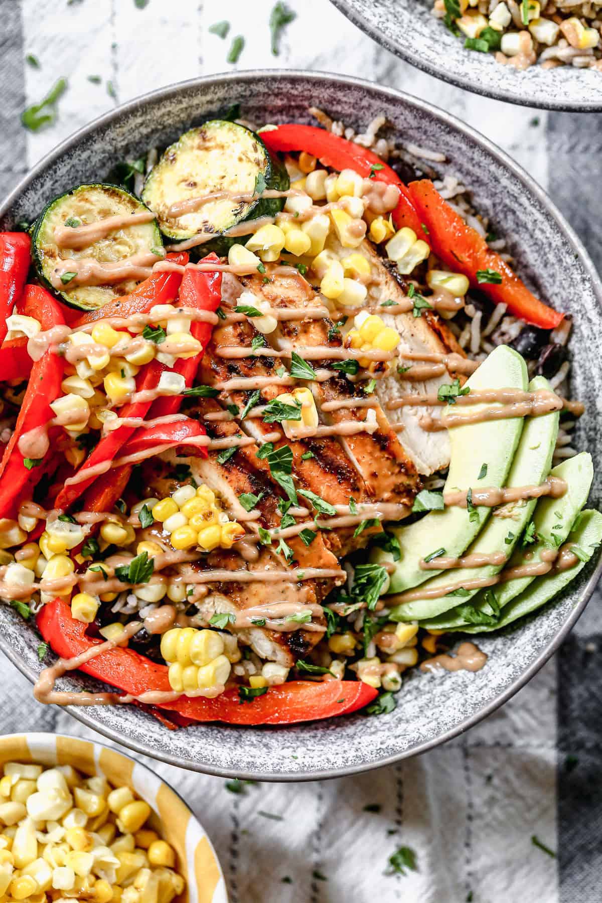 Grilled chicken, smoky vegetables, beans, and BBQ ranch dressing come together for a hearty, flavorful meal thatโs made for summer nights and easy meal prep.
