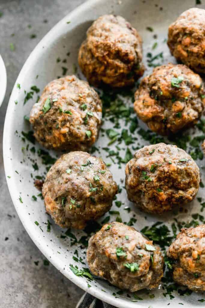 A plate filled with homemade Air Fryer Meatballs, ready to serve or freeze for another day and delicious in everything from spaghetti and meatballs to meatball subs!