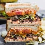 A Pimento Cheese BLT instantly elevates the classic sandwich by spreading homemade pimento cheese on the bread, bringing the perfect creamy flavor punch.