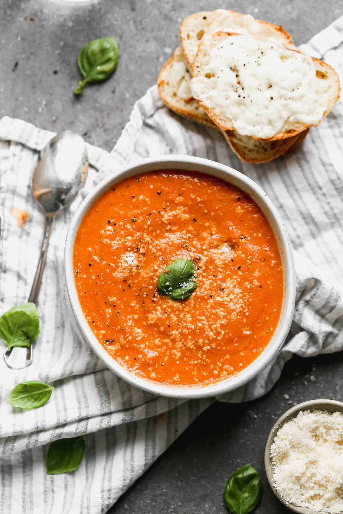 Roasted Tomato Soup has slow-roasted tomatoes and garlic blended into a rich, smooth soup that’s cozy enough for cold nights but light enough for summer.