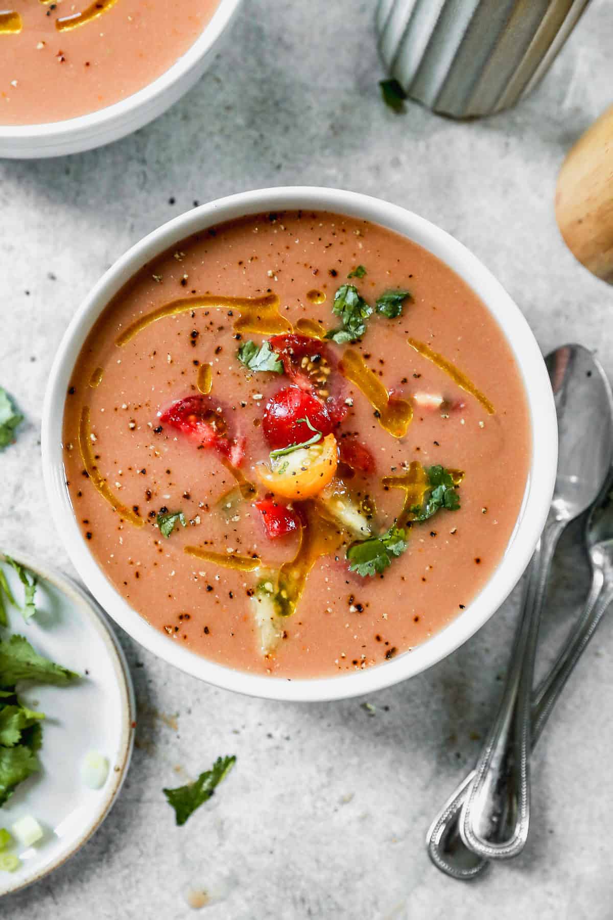 A classic Gazpacho recipe is the most refreshing drink or soup of Summer! The flavorful vegetables really shine and it's so easy to make in the blender in just a few minutes!