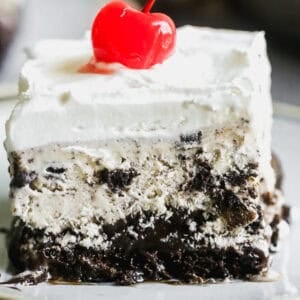 A piece of an easy Ice Cream Cake recipe served on a plate, the perfect summer dessert for potlucks or parties.
