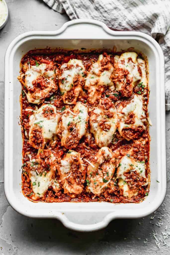 A pan of Stuffed Shells is comfort food at it's finest and perfect to double and make multiple pans to freeze for effortless dinners later.