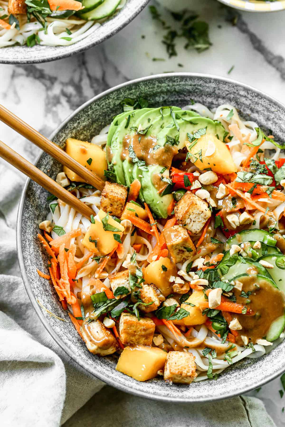 These spring roll bowls bring together crunchy veggies, rice noodles, and sweet chili peanut sauce for a light, fresh, and flavor-packed meal that skips the rolling.