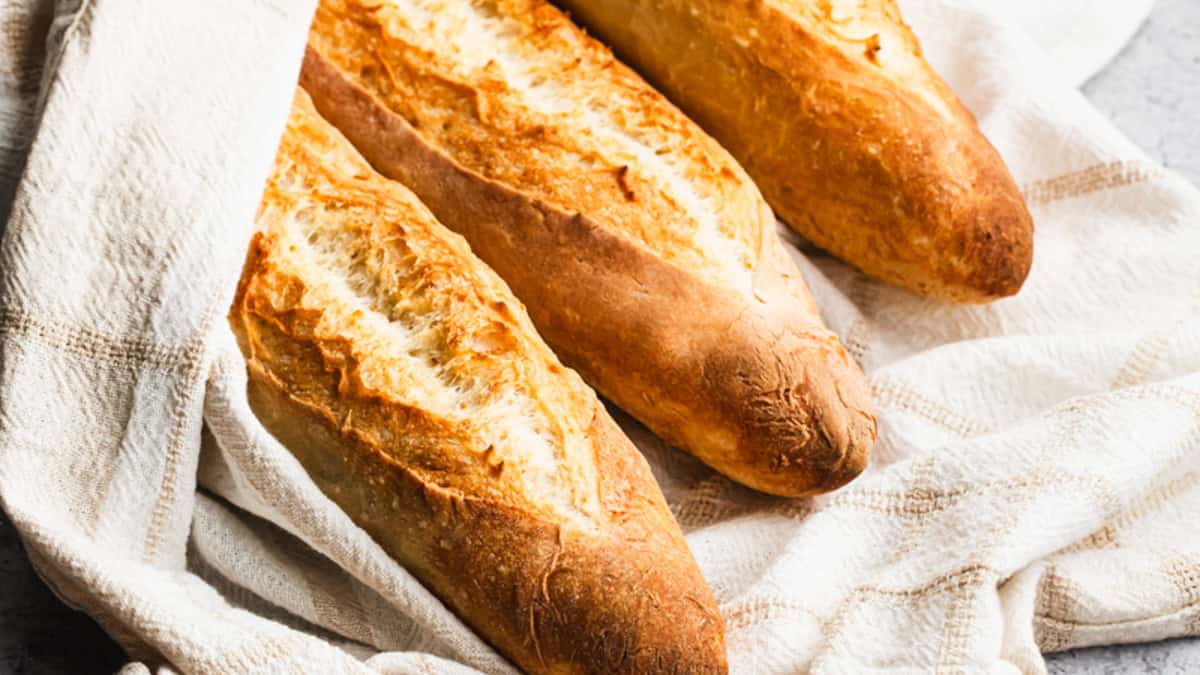 This homemade Baguette recipe is easy, made with only 4 ingredients, and tastes better than the restaurant! It instantly elevates any meal!