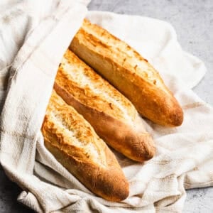 This homemade Baguette recipe is easy, made with only 4 ingredients, and tastes better than the restaurant! It instantly elevates any meal!
