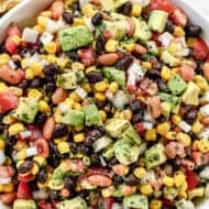 This zesty cowboy caviar bean and veggie mix is perfect for scooping or spooning over tacos.