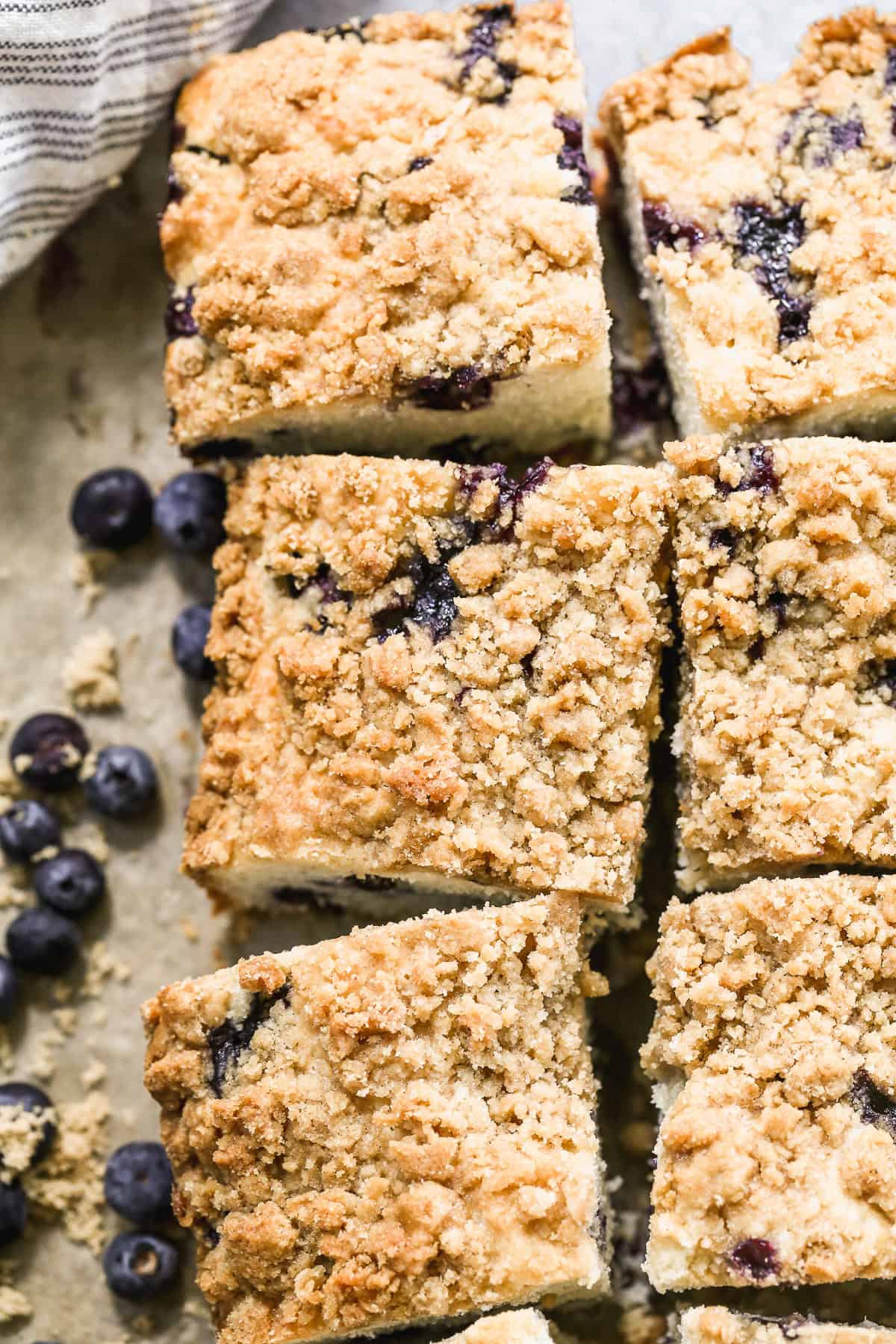 This blueberry coffee cake is a soft, cinnamon-scented treat perfect for weekend brunch gatherings.
