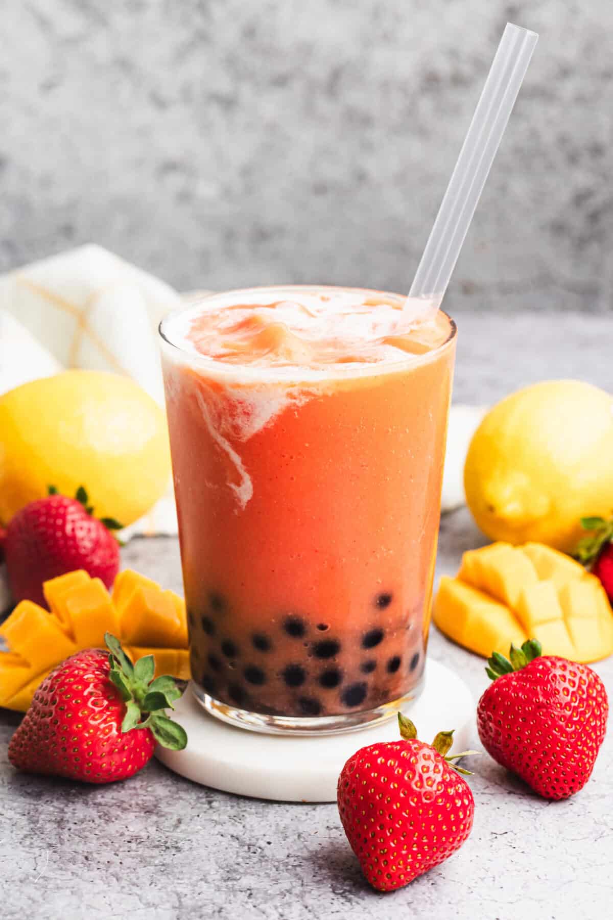 This easy Boba Smoothie recipe has a flavorful and tropical smoothie combined with popping boba bubbles. It's sweet, satisfying, and the perfect drink!
