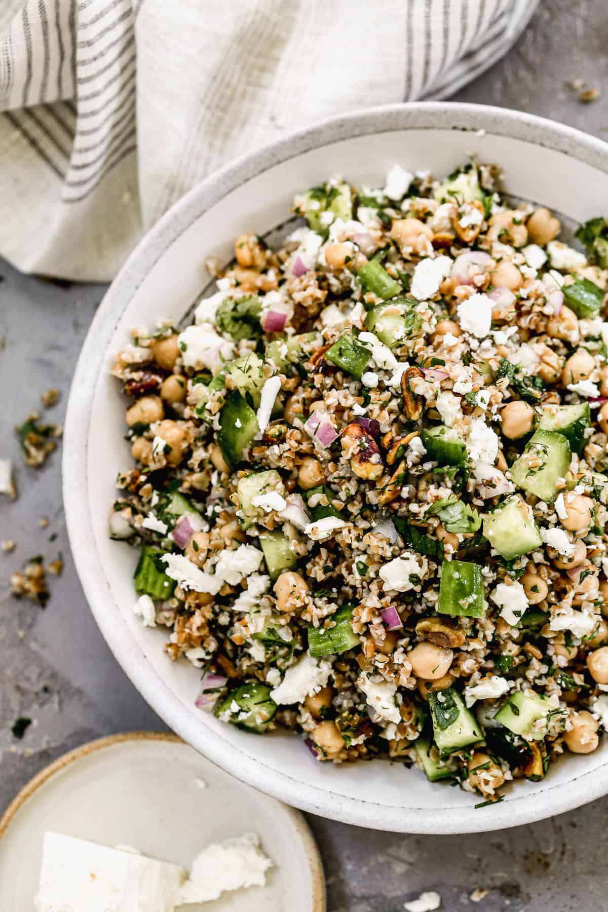 This bulgur salad is a quick and healthy side with vegetables, feta, and a light dressing.