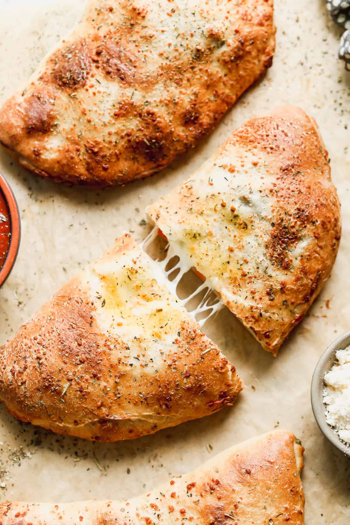 These homemade calzones are a delicious grab-and-go option that’s easy to prep, bake, and customize for the whole family.