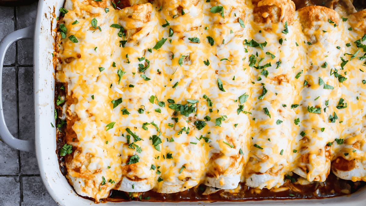 These saucy chicken enchiladas are even better with leftover rice folded into the filling.