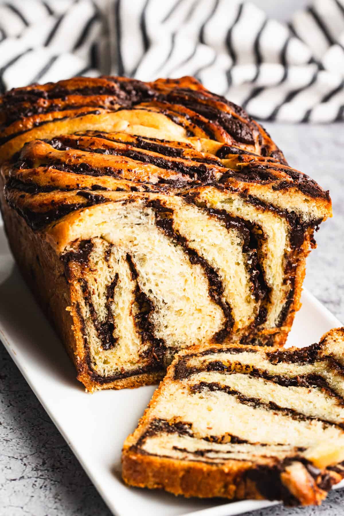This homemade chocolate babka delivers soft, pillowy texture with rich chocolate swirls. Perfect for an impressive dessert to end date night.