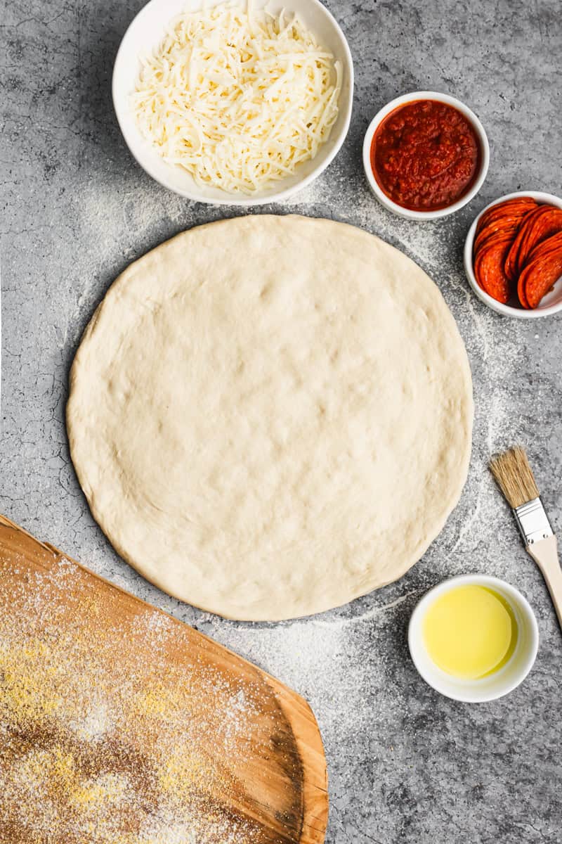 This homemade pizza dough recipe is a go-to base that makes pizza night easier, faster, and better than takeout.