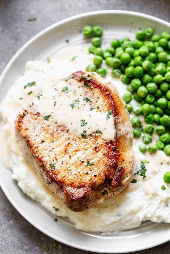 These juicy pork chops with creamy mustard sauce make an easy weeknight dinner that feels extra special.