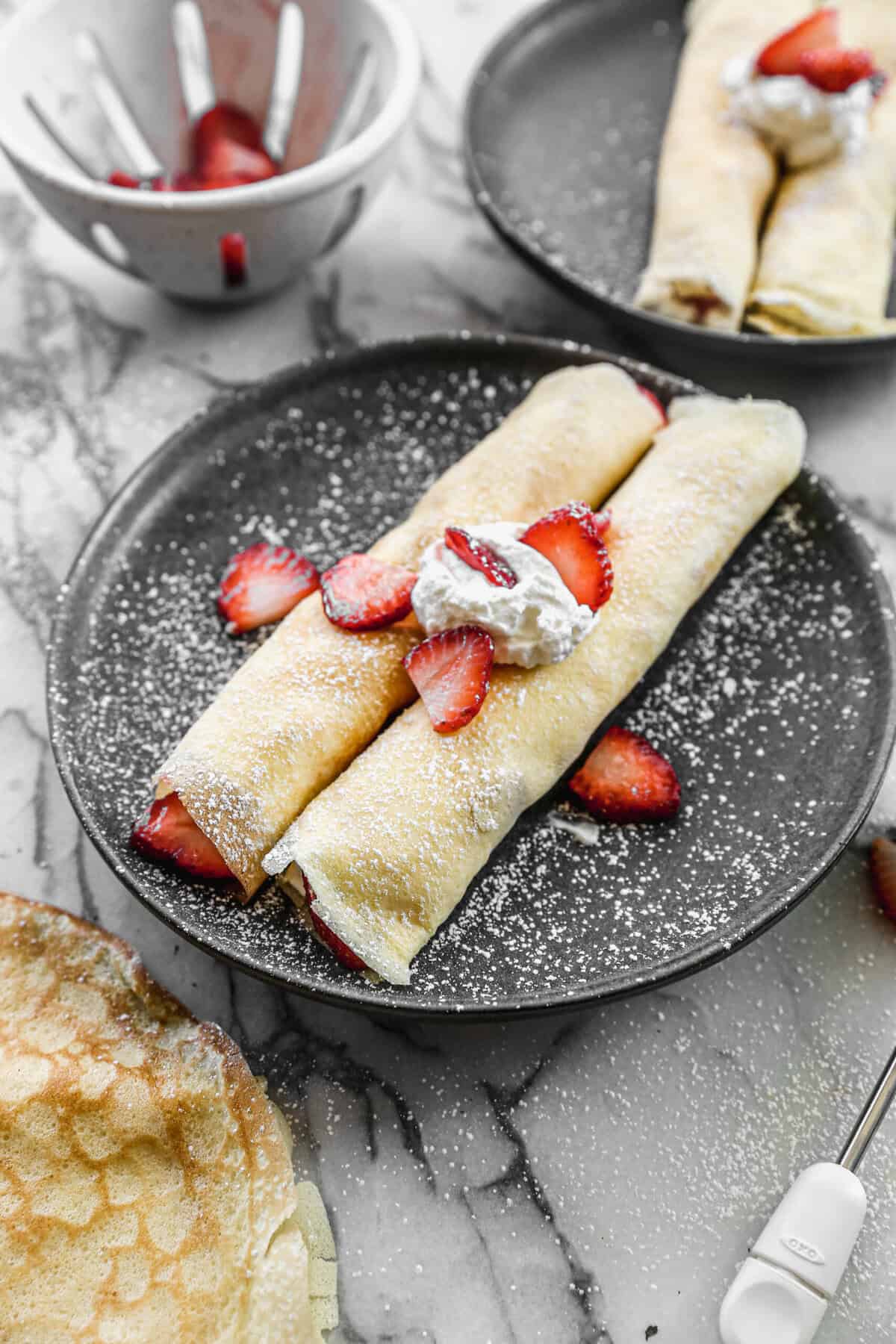 These strawberries and cream crepes are soft, sweet, and perfect for an elegant, no-fuss dessert for two.