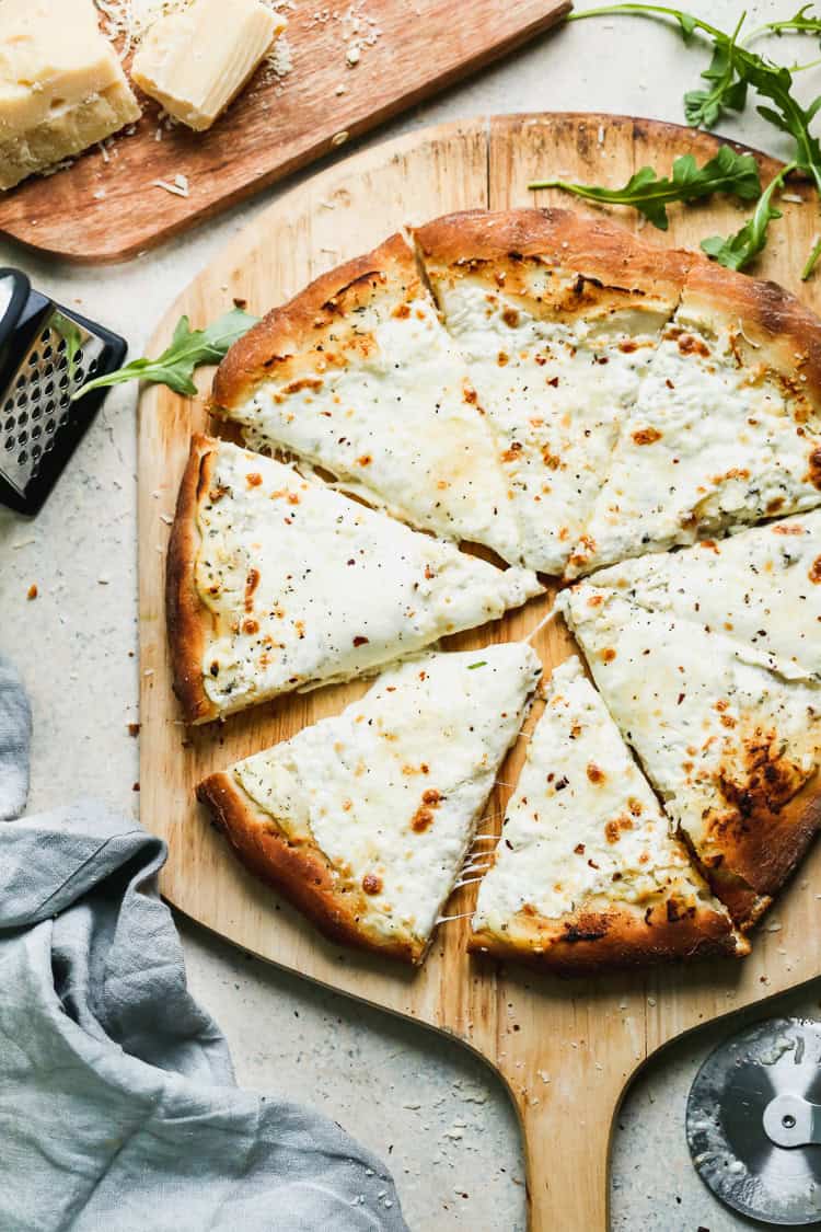 This white pizza recipe is ideal for when you want a creamy, cheese-forward alternative to traditional pies.